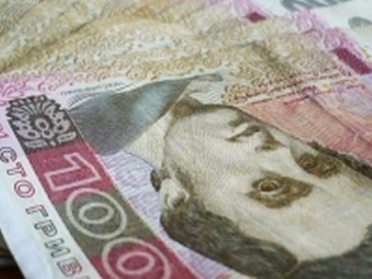 Нацбанк ослабил курс гривни на четыре копейки