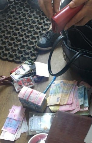 Полиция провела масштабные обыски в обменниках Харьковской области: что искали